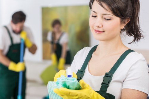 Professional cleaners maintaining desks and shared office spaces in Fulham